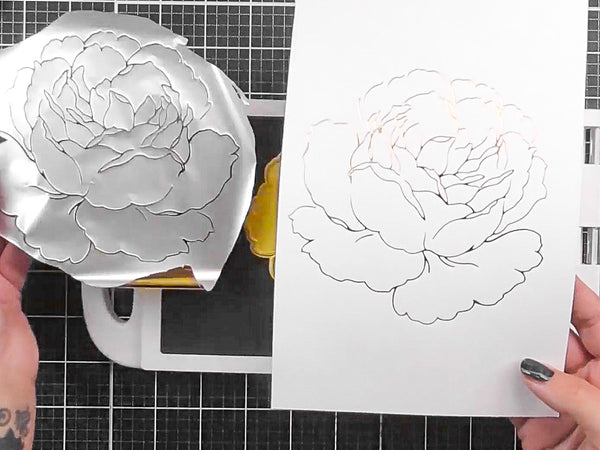 Use heat to carefully transfer the foil onto paper. Handle with care!